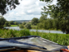The river Meuse wanders off through the fields, visible alongside the canal.