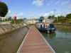 The first lock (southbound) with sloping walls; locking made easy by a floating pontoon.