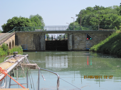 The next lock, at PK16.7 lock #65 Etrepy, shows both red and green lights, which means we must wait while the lock is drained and the gates open.