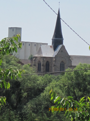 Common sights on the canals of eastern France are church spires and agricultural silos.