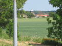 The countryside is mainly agricultural, with red-roofed villages along the canal route. This is Contrisson.