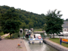 Late July on the Nivernais; two boats exit the lock at Chatel Censoir while three more wait to enter. To the right of the lock there is a port with water & electric. 