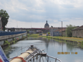 Entering the city of Bar-le-Duc. The blue & white sign on the right side marks the regional office of VNF, the French waterway authority.